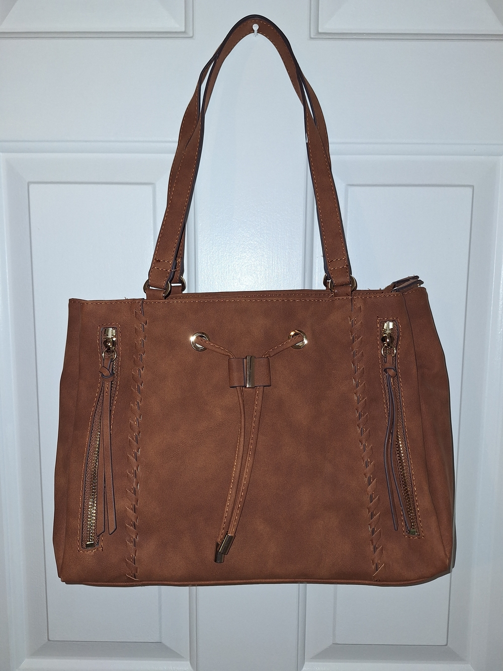 Rosetti Tan Leather Trim with Gold Logo Plate